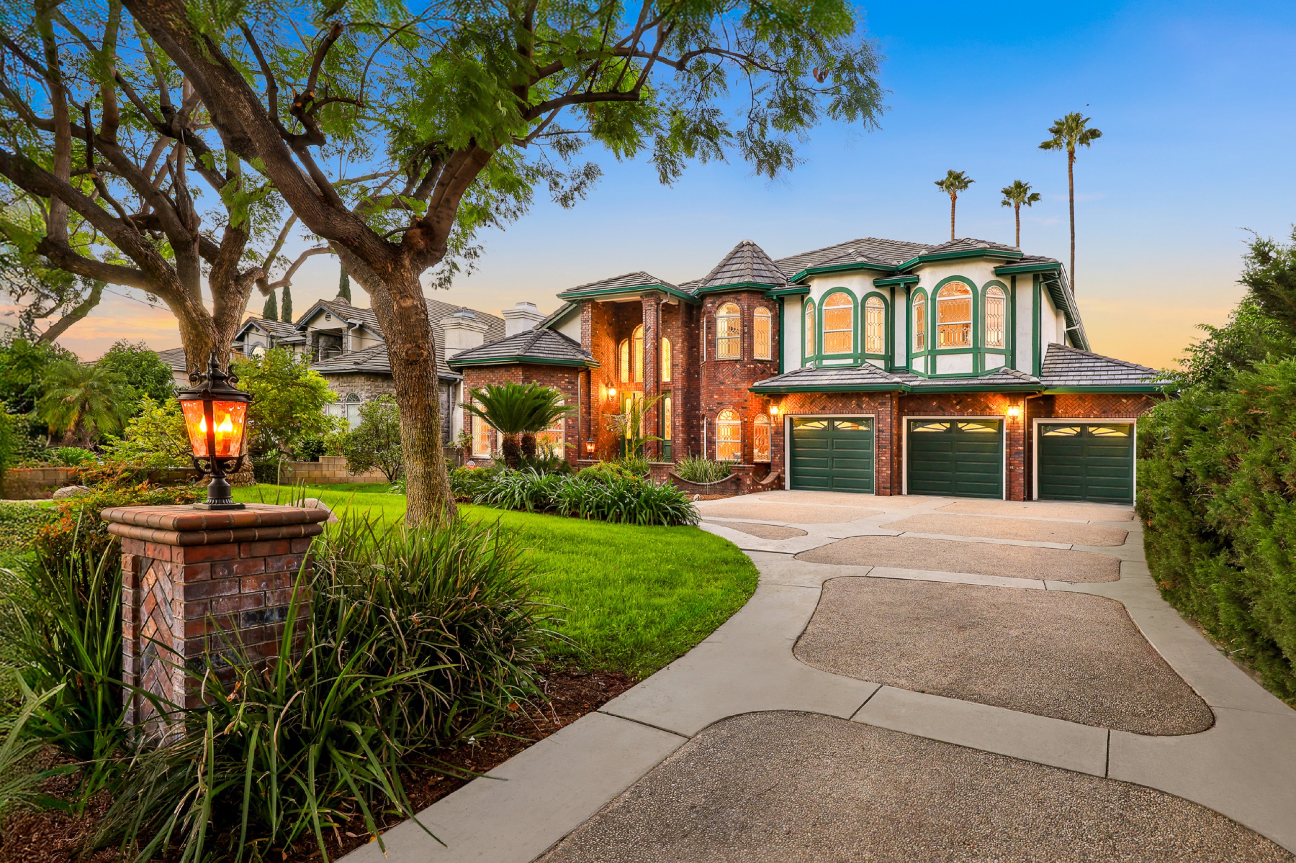 Front exterior of 151 E Longden Ave, a French Normandy estate in Arcadia
